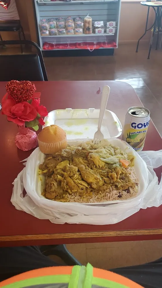 Curry Chicken with Rice Beans Cabbage Corn Muffin